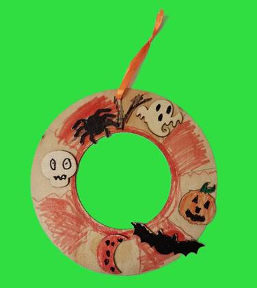 A handmade decoration with a green background